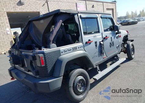 2015 Jeep Wrangler Unlimited Sport z USA, uszkodzony, nr VIN 1C4BJWDG7FL587014